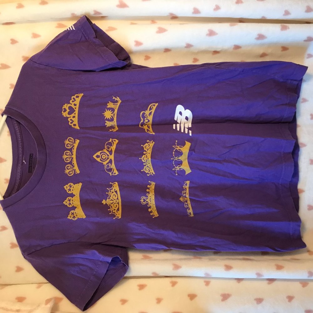 Purple running shirt with all Disney crowns